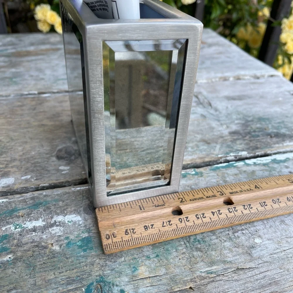 Silver mirror toothbrush holder